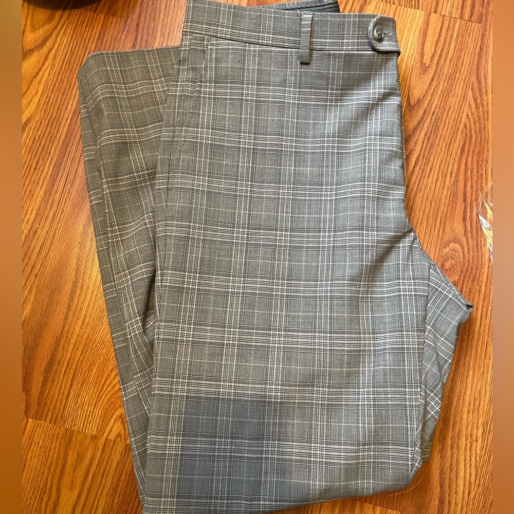 Men’s 36”x30” grey dress pants by Jospeh Abboud. Measurements in pants